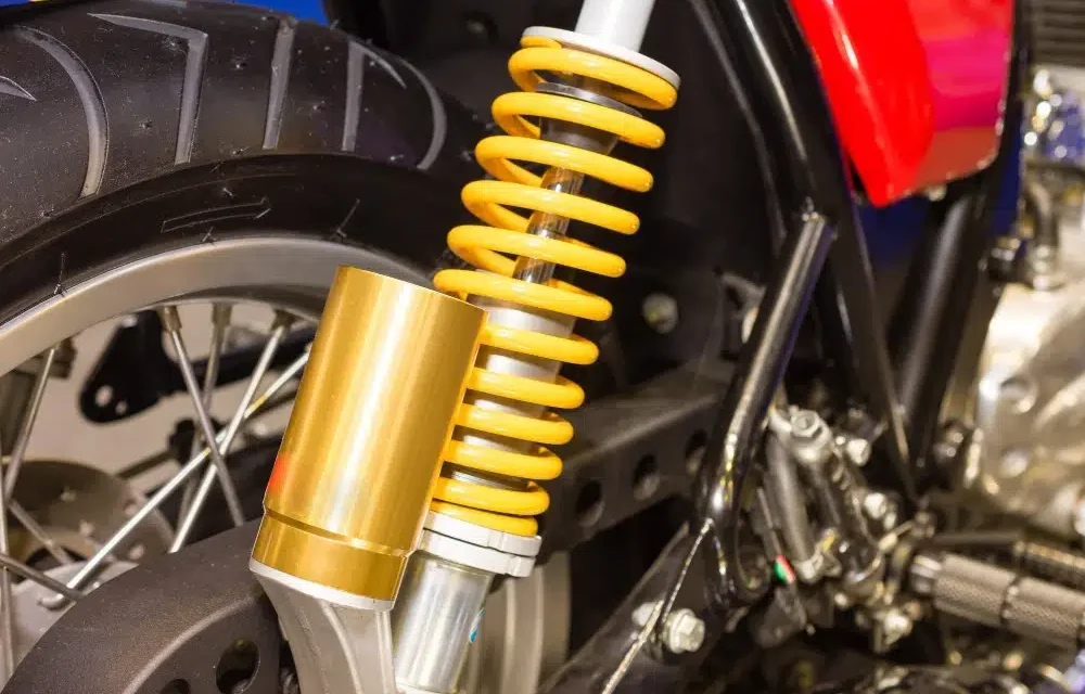 Peredam Benturan Sepeda Motor Pada Komponen Shock