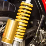 Peredam Benturan Sepeda Motor Pada Komponen Shock